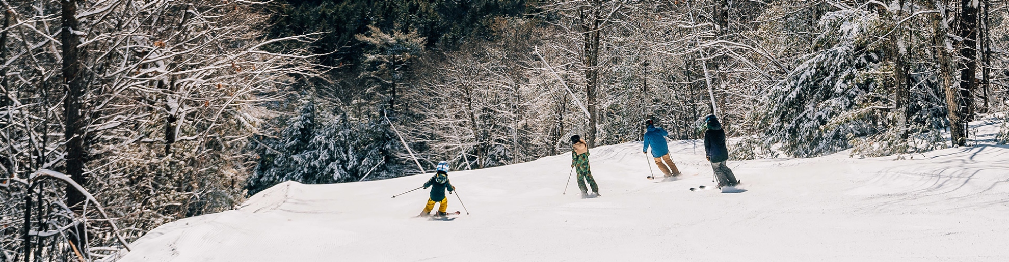Murphy Family skis toward the East Lodge